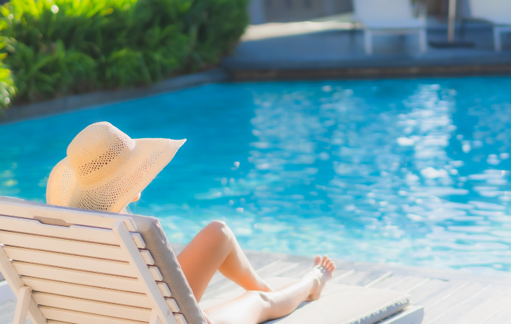 portrait-beautiful-young-asian-woman-happy-smile-relax-around-outdoor-swimming-pool-in-hotel-resort%201.png